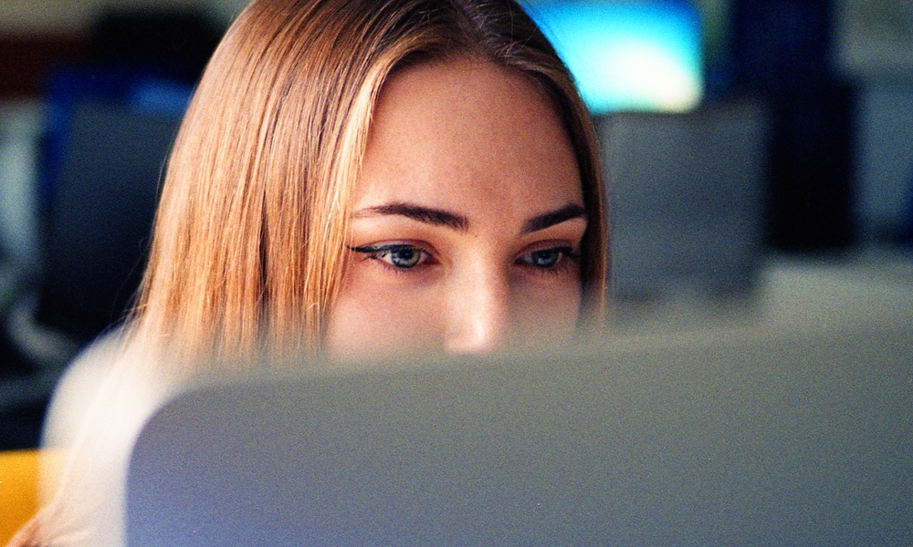 Woman looking at computer screen