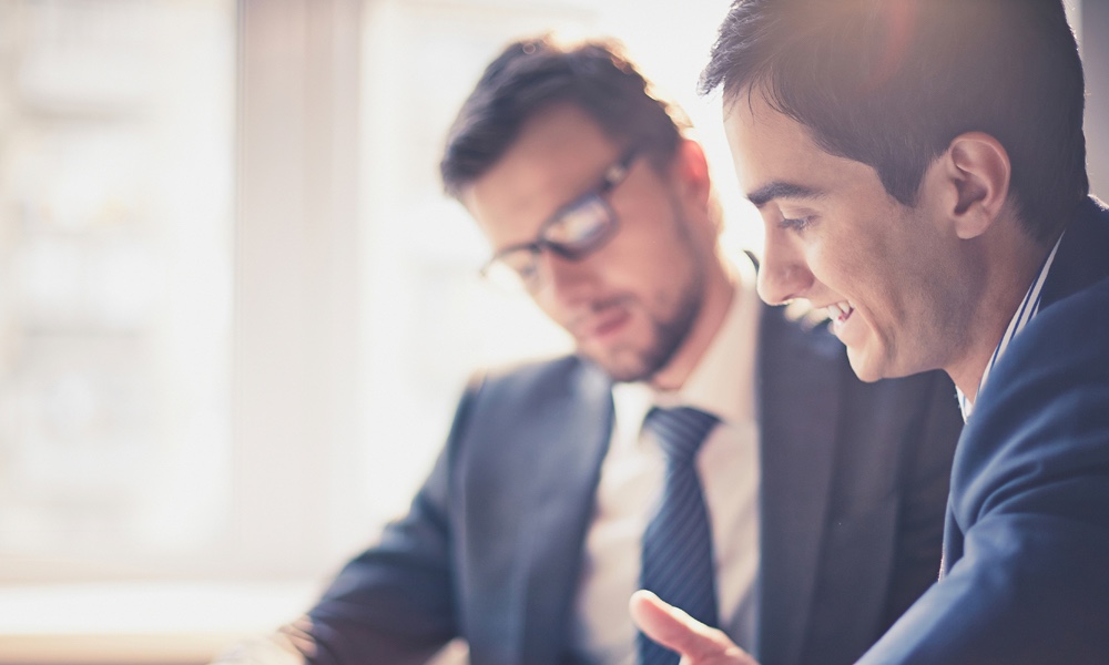 Two men in disccussion